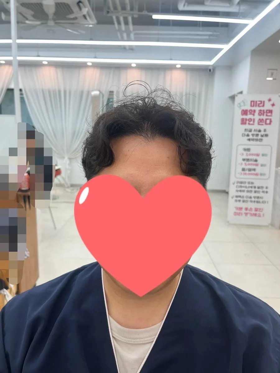 자연스러운 컬로 마무리된 남자 아이롱펌
