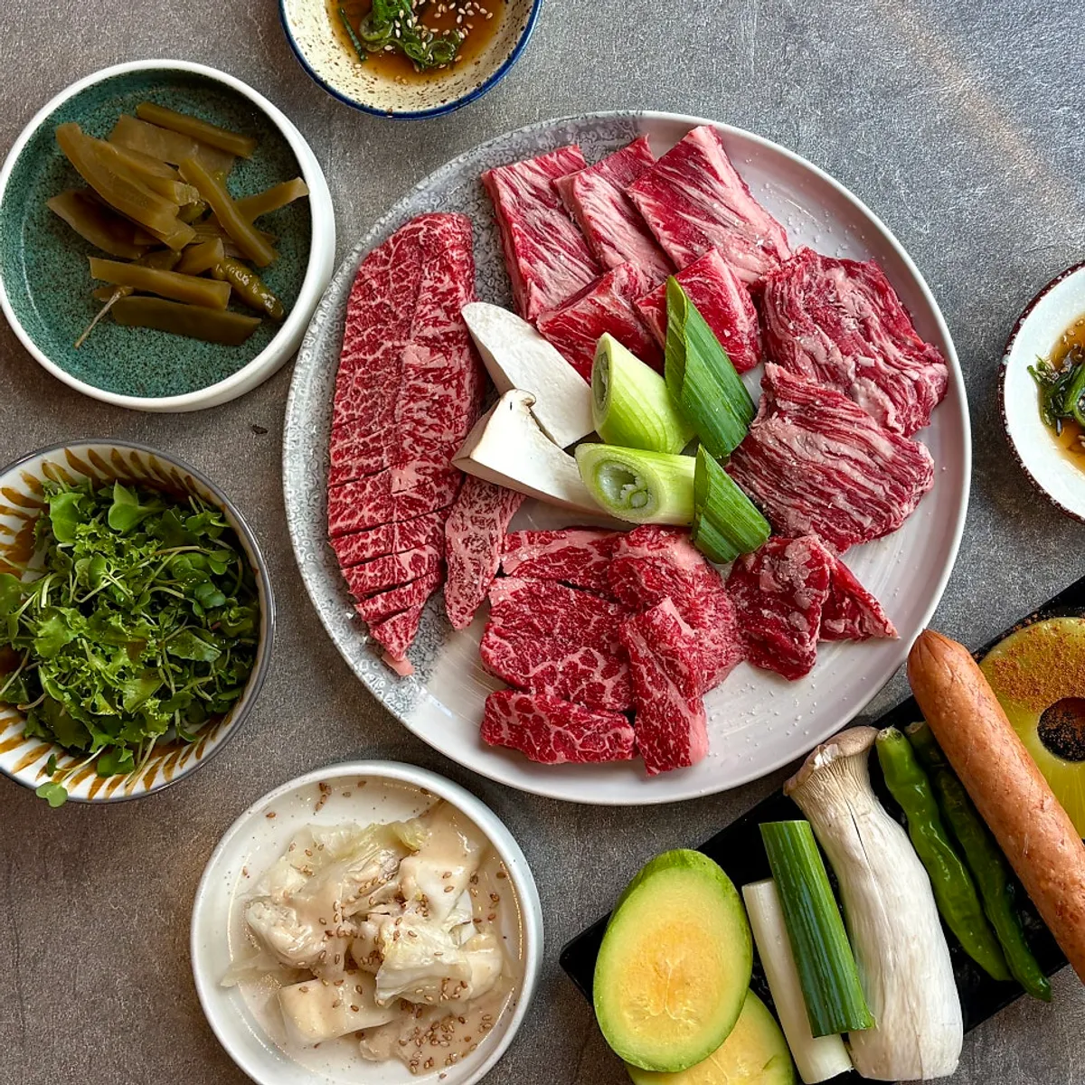 Wagyu grilling over a brazier at Utan near Isu Station