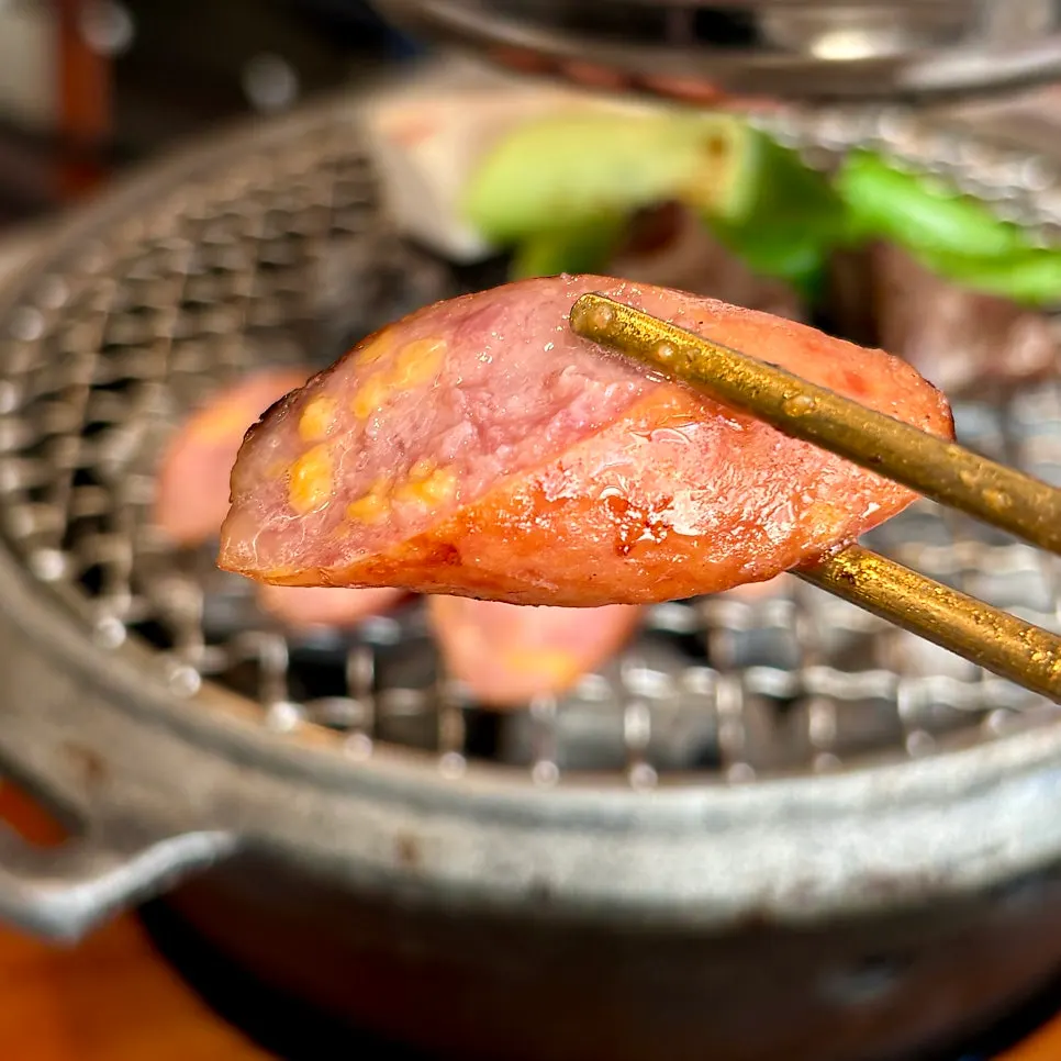 Cheese sausage grilled golden brown on the brazier