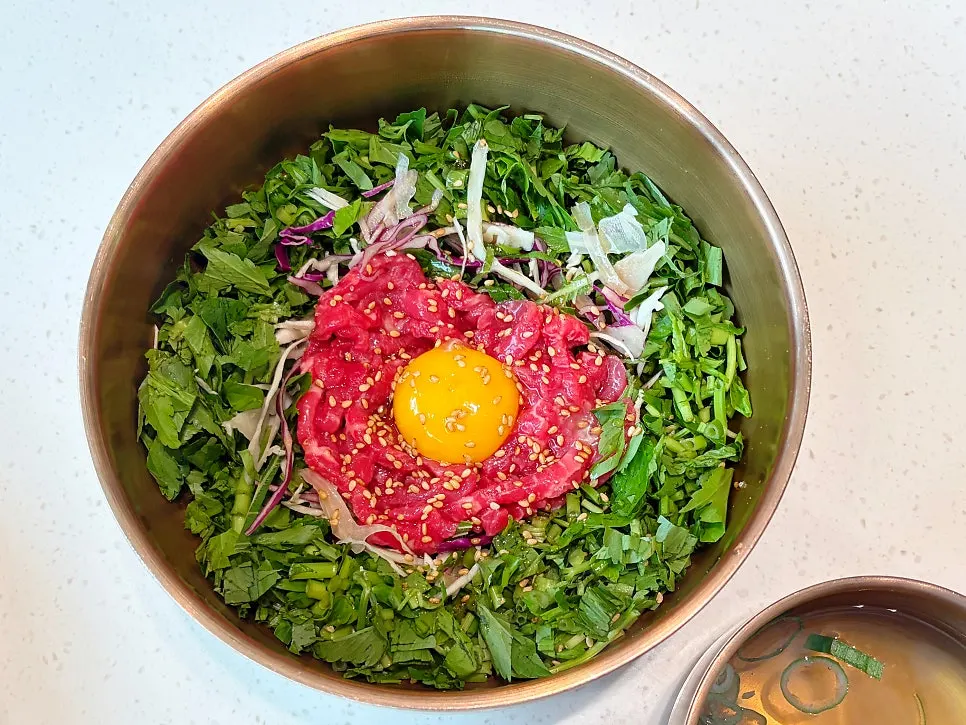 Yukjeon served with soy sauce and chive salad