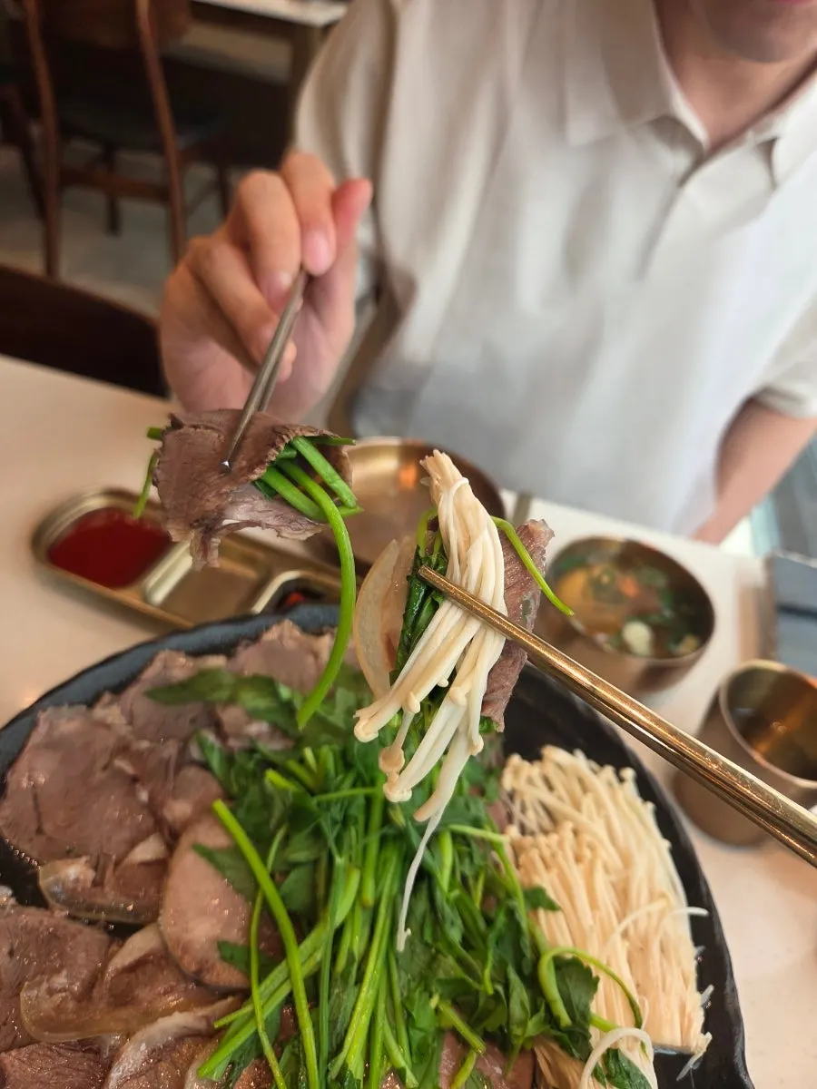 The red dipping sauce served with the suyuk