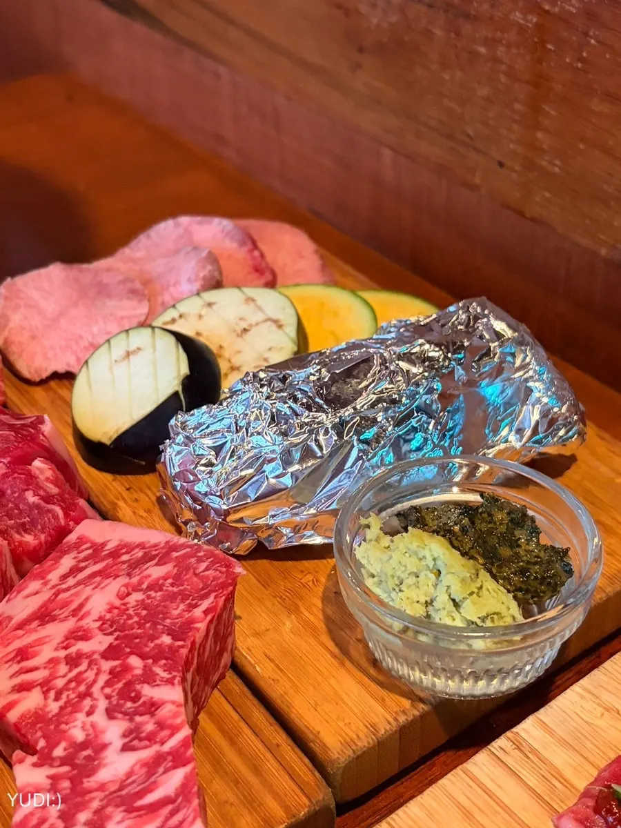 Assorted hanwoo cuts plated showing marbling