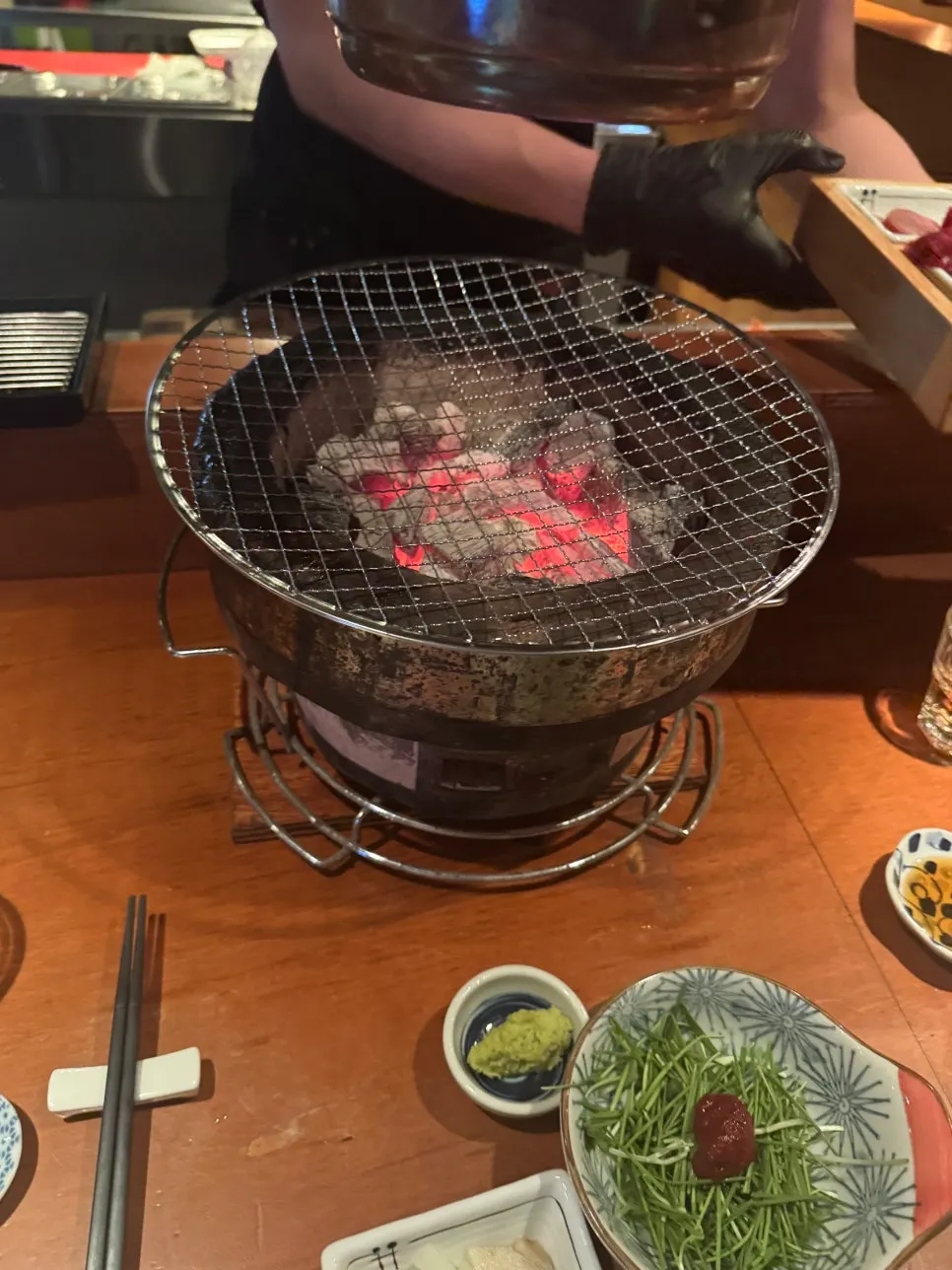Wooden counter and tabletop brazier at Usiya Seongsu Branch