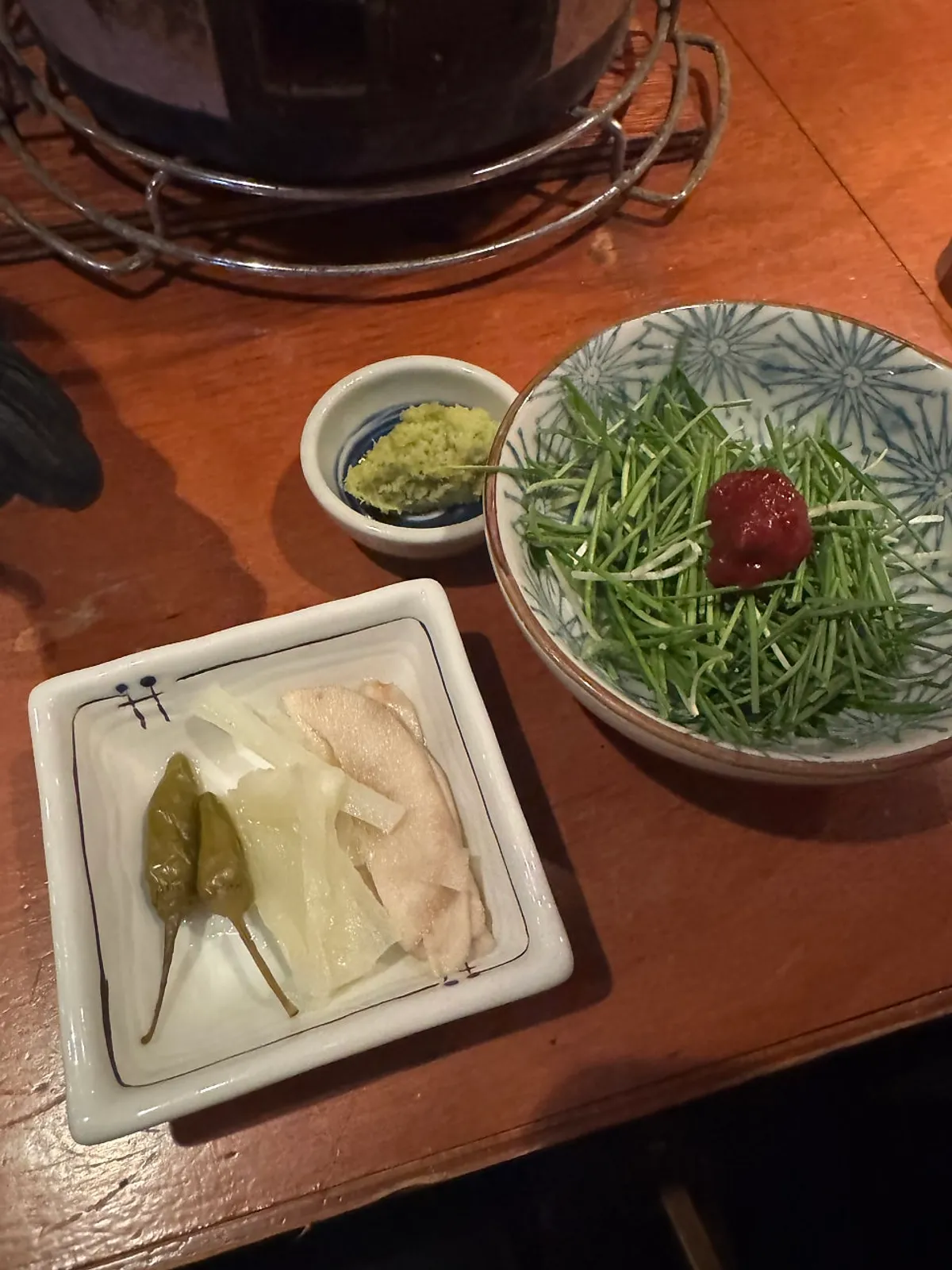 Counter seats in front of the charcoal brazier at Usiya Seongsu Branch