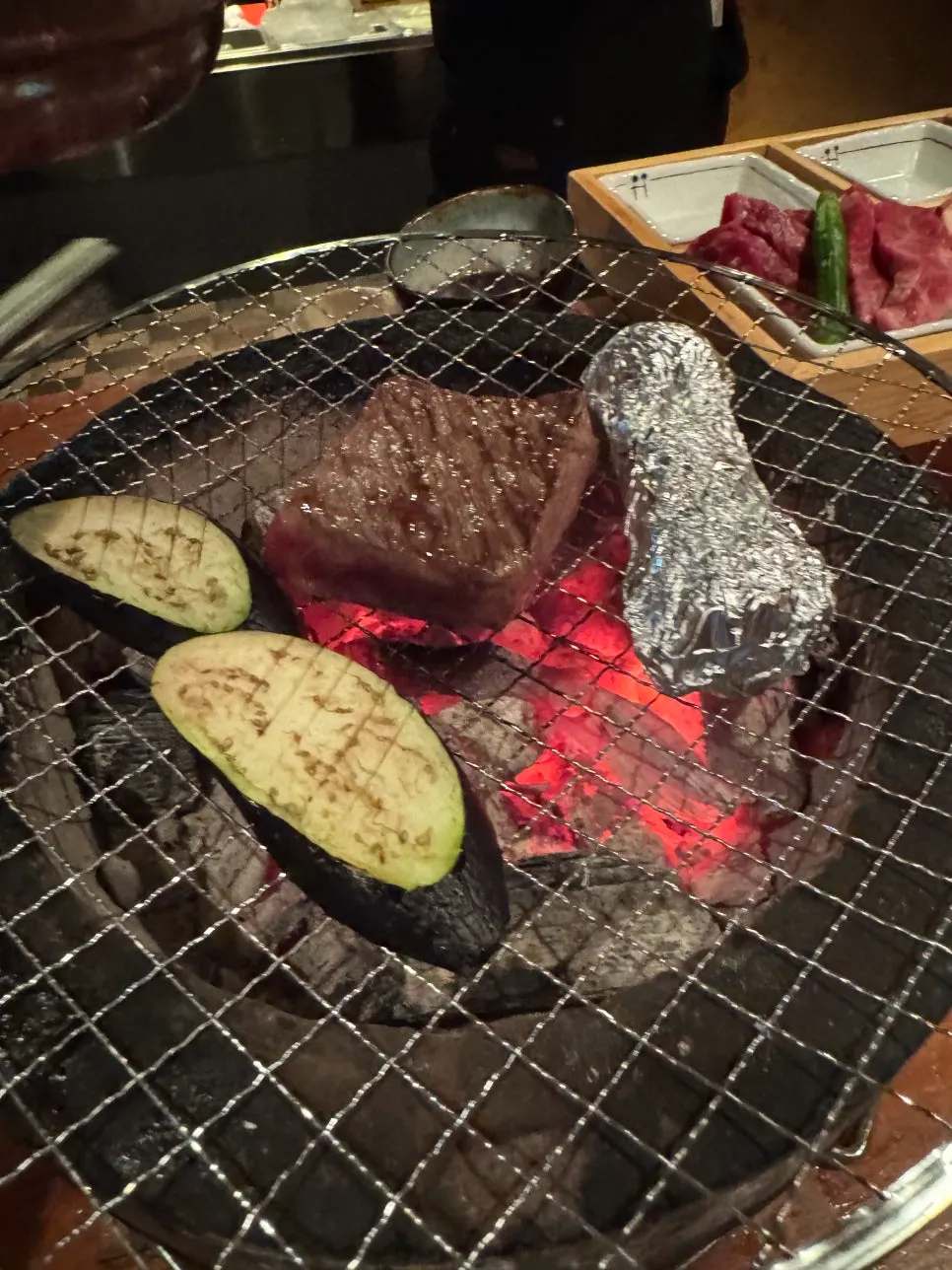 Thickly sliced grilled beef on a wire rack