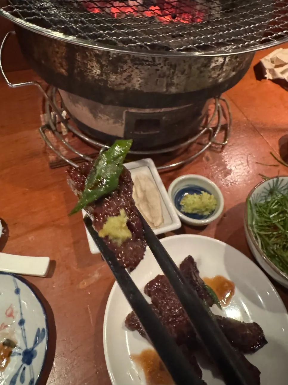 Kkwarigochu grilled alongside the meat