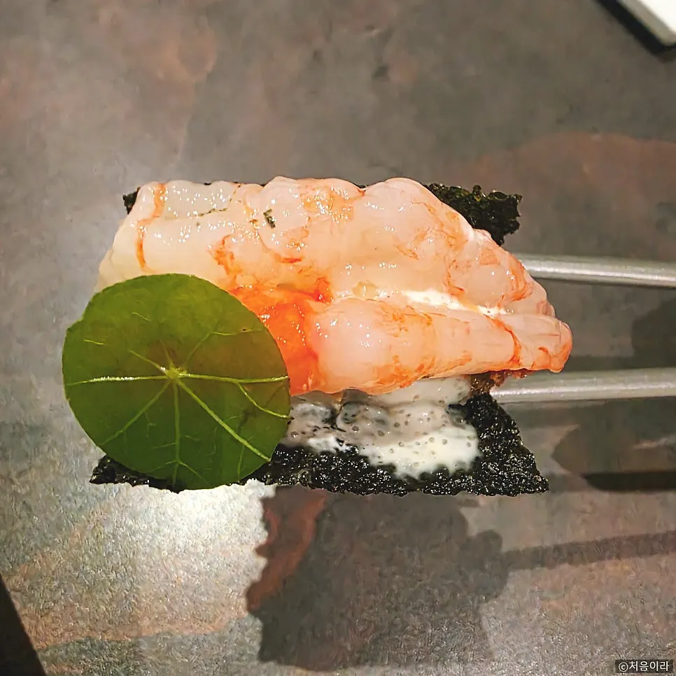 Pollack roe gim-bugak dish with fried abalone innard rice and sweet shrimp