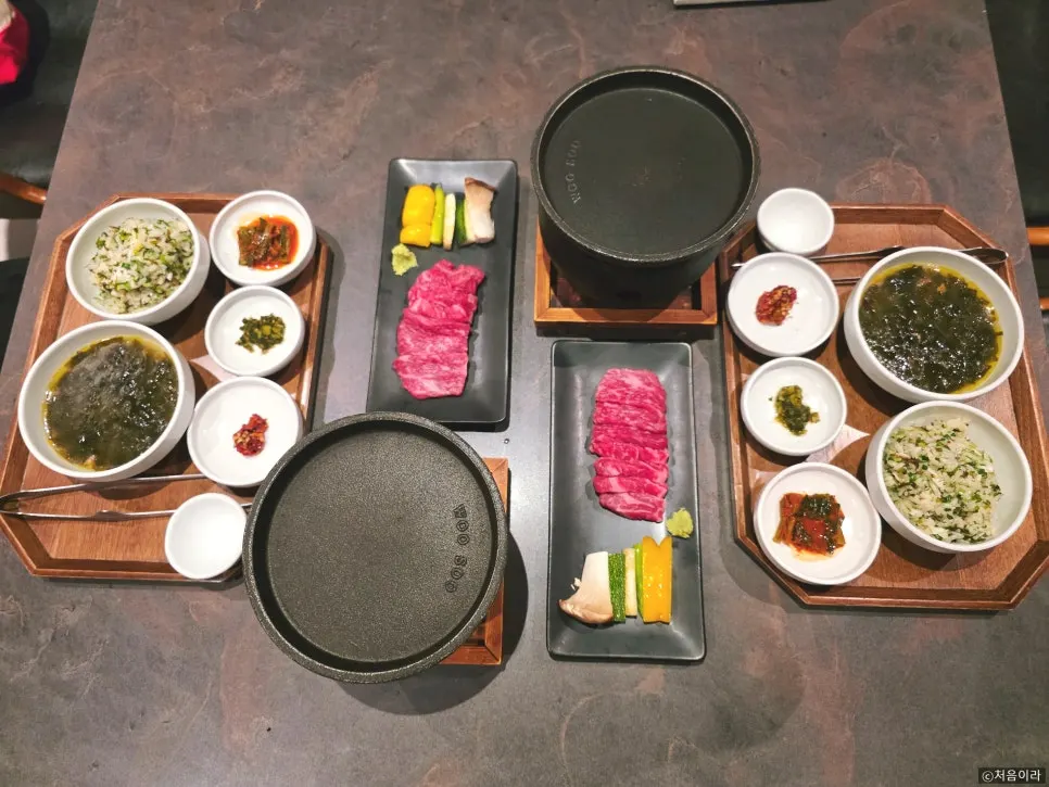 1++ grade hanwoo sirloin with a full table spread