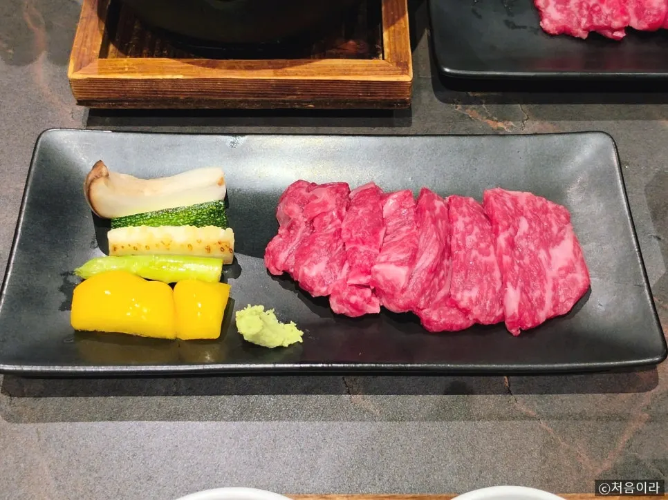 1++ grade hanwoo sirloin grilled over a personal charcoal brazier