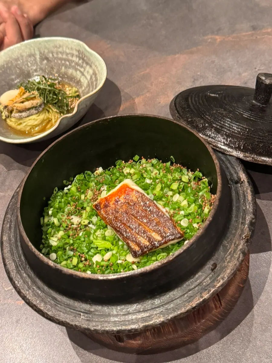 Seasonal sea bream pot rice mixed by a staff member