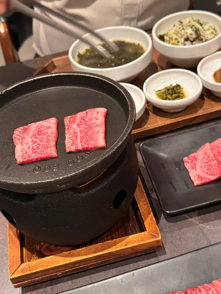 Hanwoo cooking on the individual tabletop grill