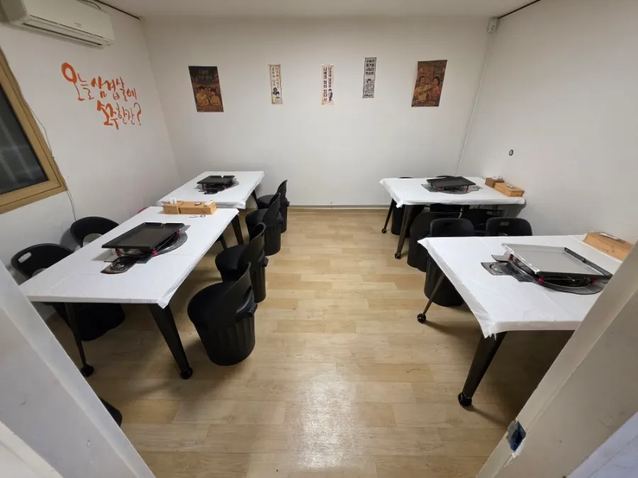 Spacious dining hall of Woosam Bunpyeong Direct Branch, tables freshly cleared