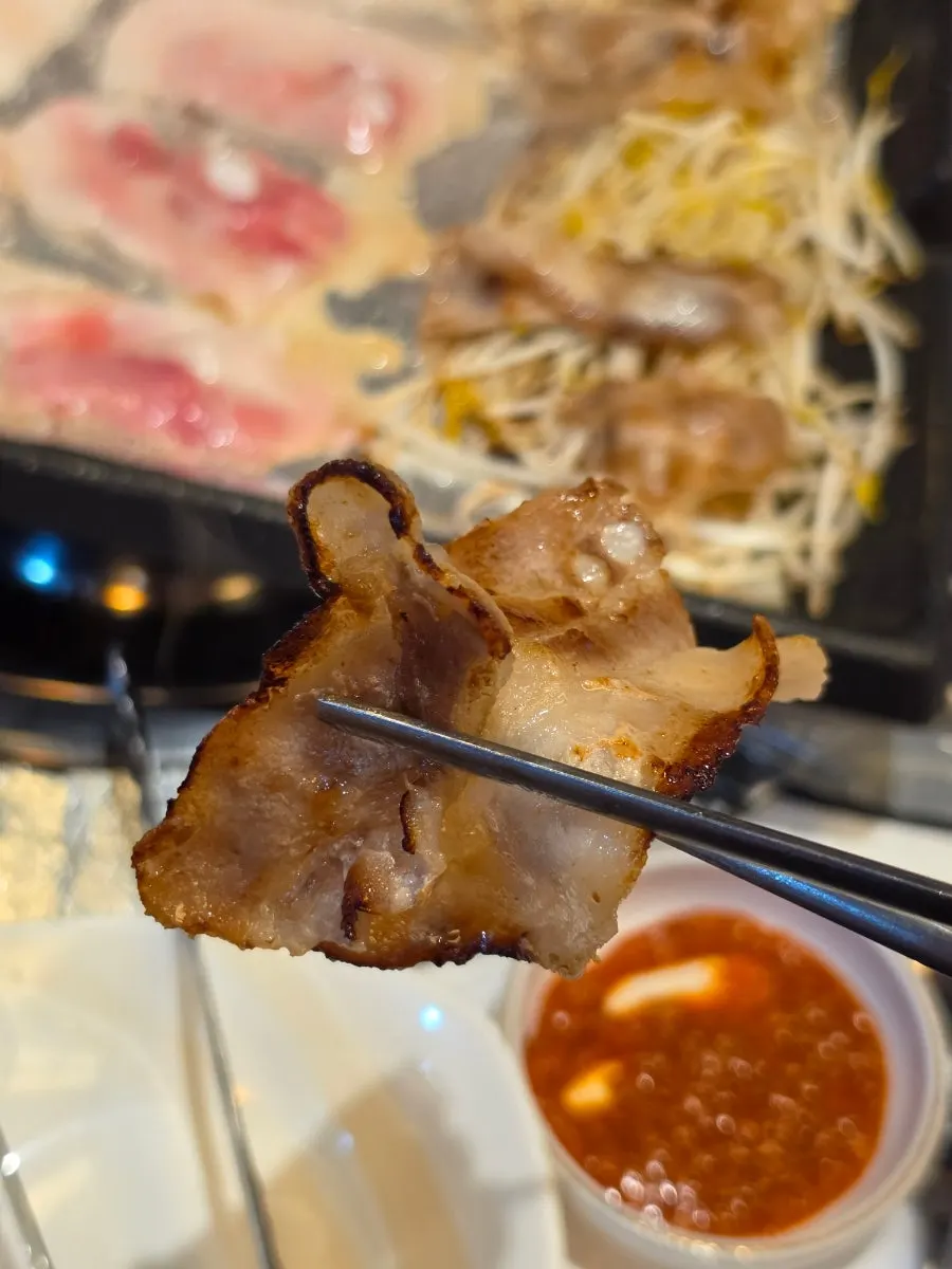 Finished frozen pork belly, shaken and grilled to completion