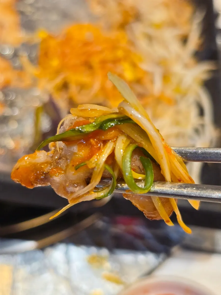 Close-up of well-cooked thin-sliced pork belly