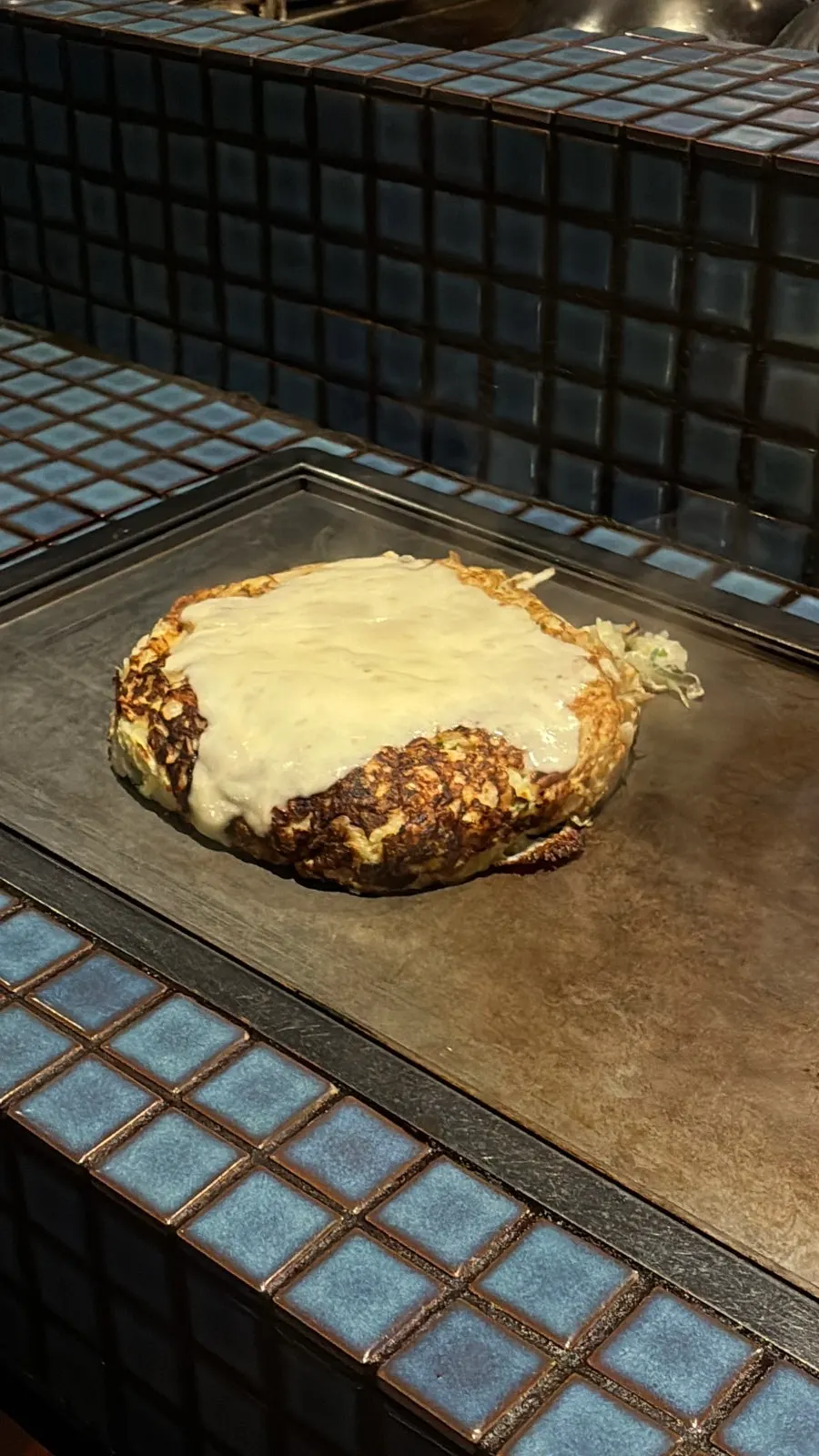 Gluten-free okonomiyaki topped with tomato sauce