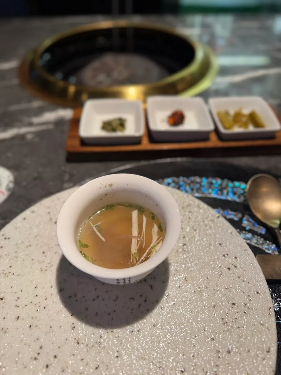 Hanwoo gomtang served in a small cup at Woowine