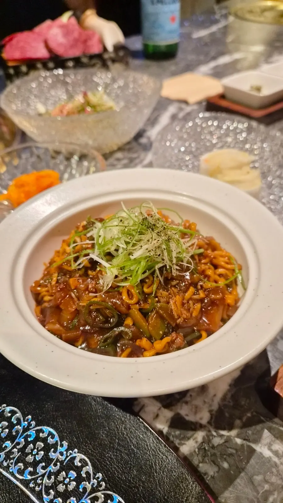 A piece of hanwoo served with salt and wasabi