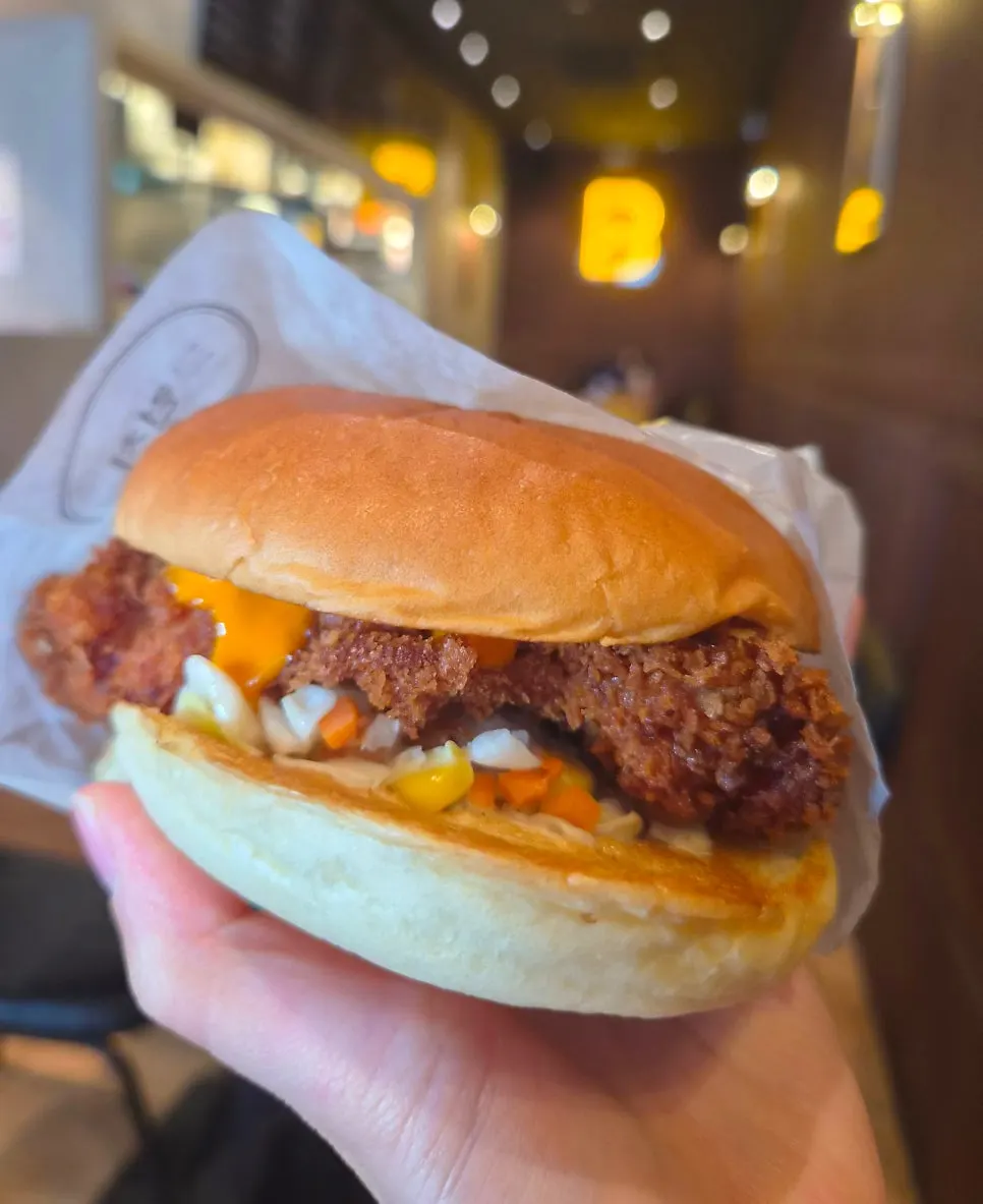 Cross-section of the Tamyok Burger showing juicy patty