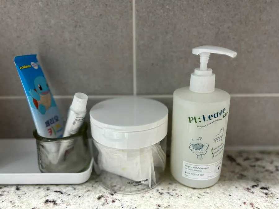 Plivme shampoo placed beside toothpaste
