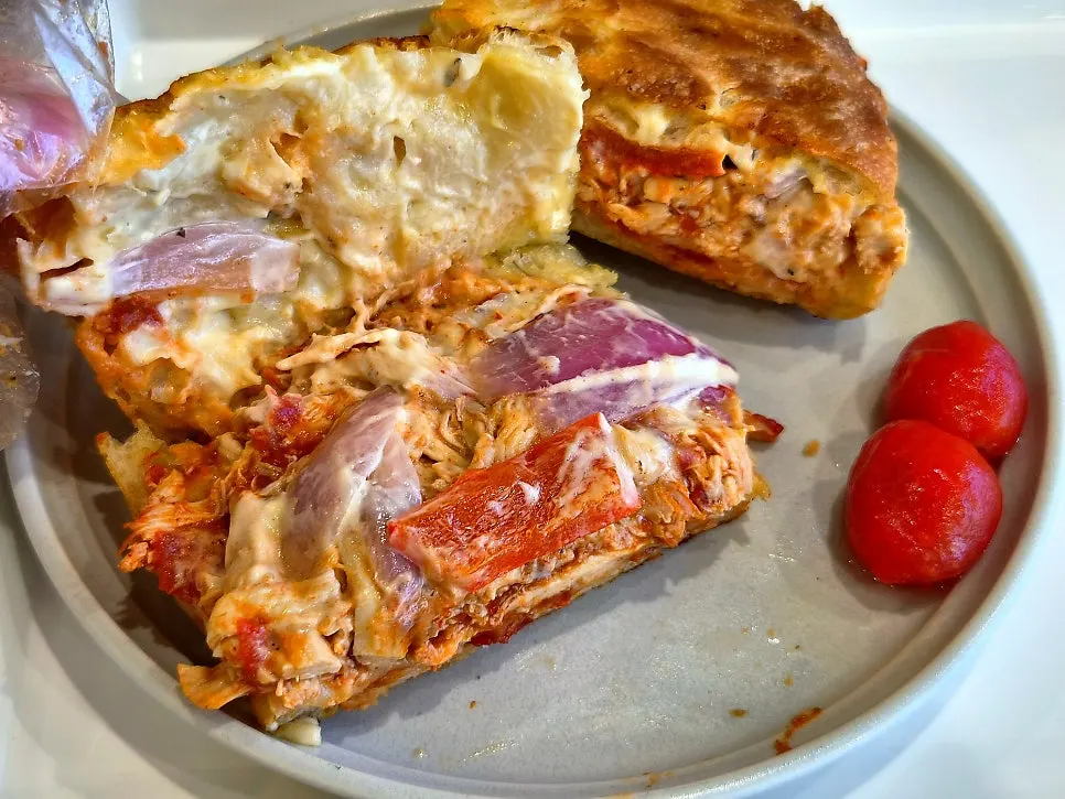 Cross-section of the BBQ chicken sandwich packed into focaccia