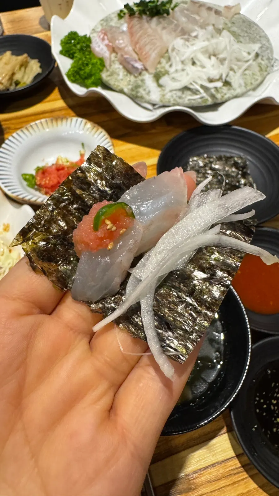 A plate of flounder and rockfish sashimi for two