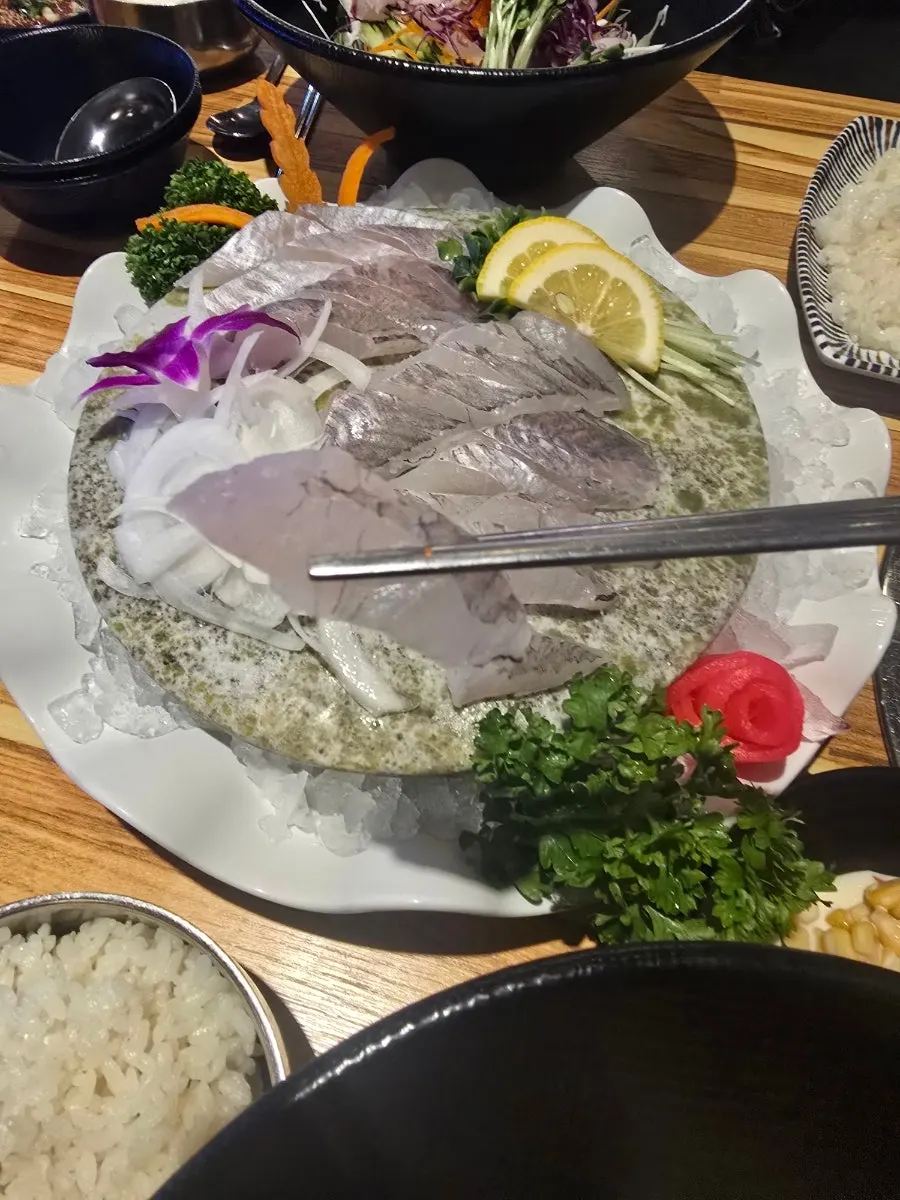 Single serving plate of thick-sliced rockfish sashimi