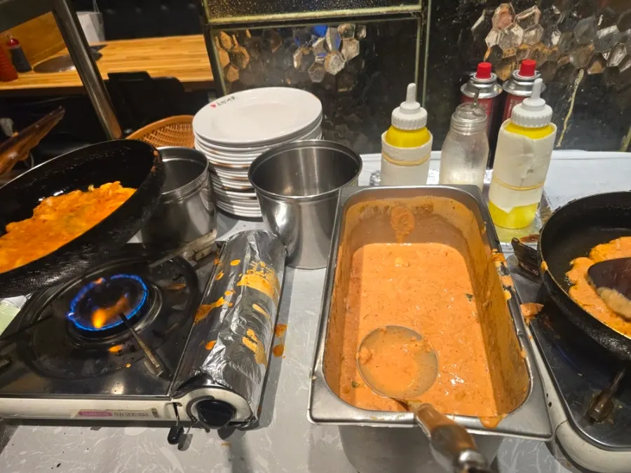 Self-made pancake cooking on the griddle