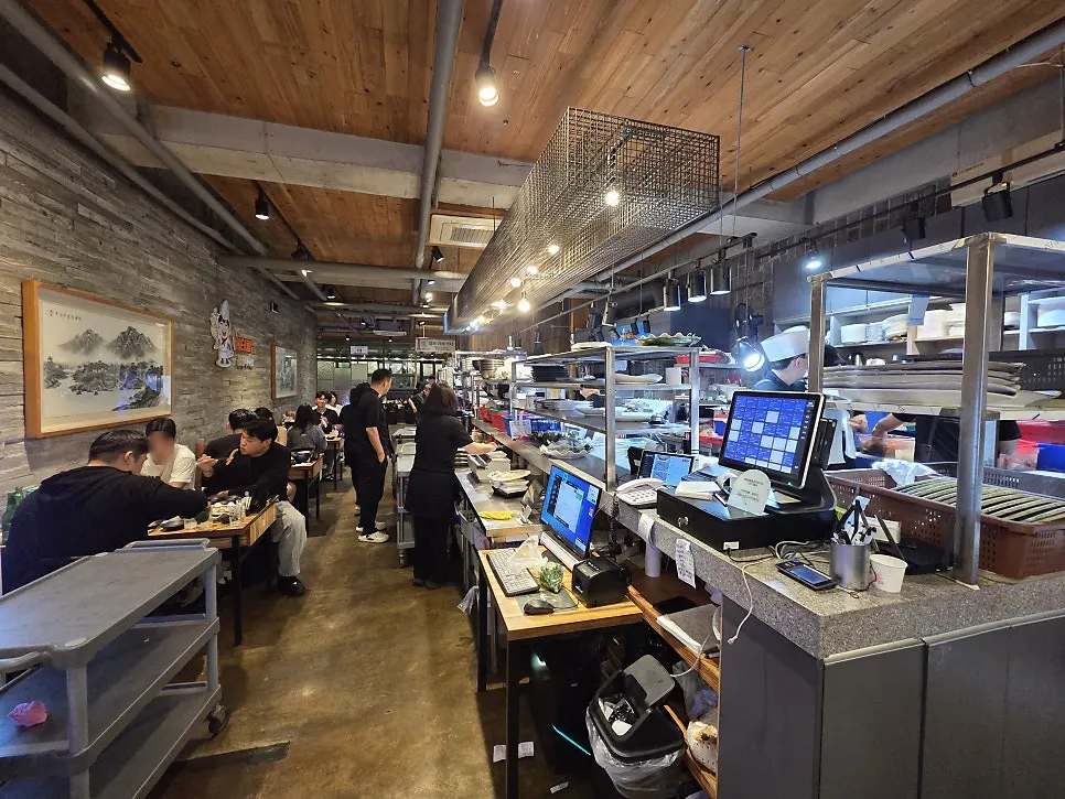 Interior of the restaurant with a spacious hall and tables