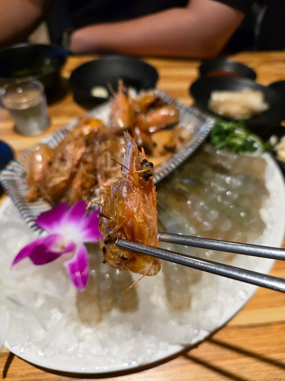 Plate of prepared raw shrimp sashimi