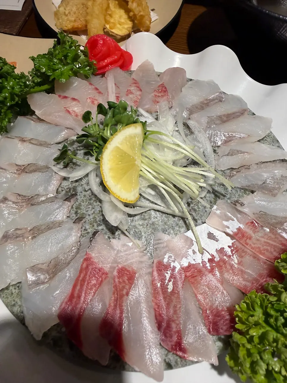 Seasonal assorted sashimi served over crushed ice