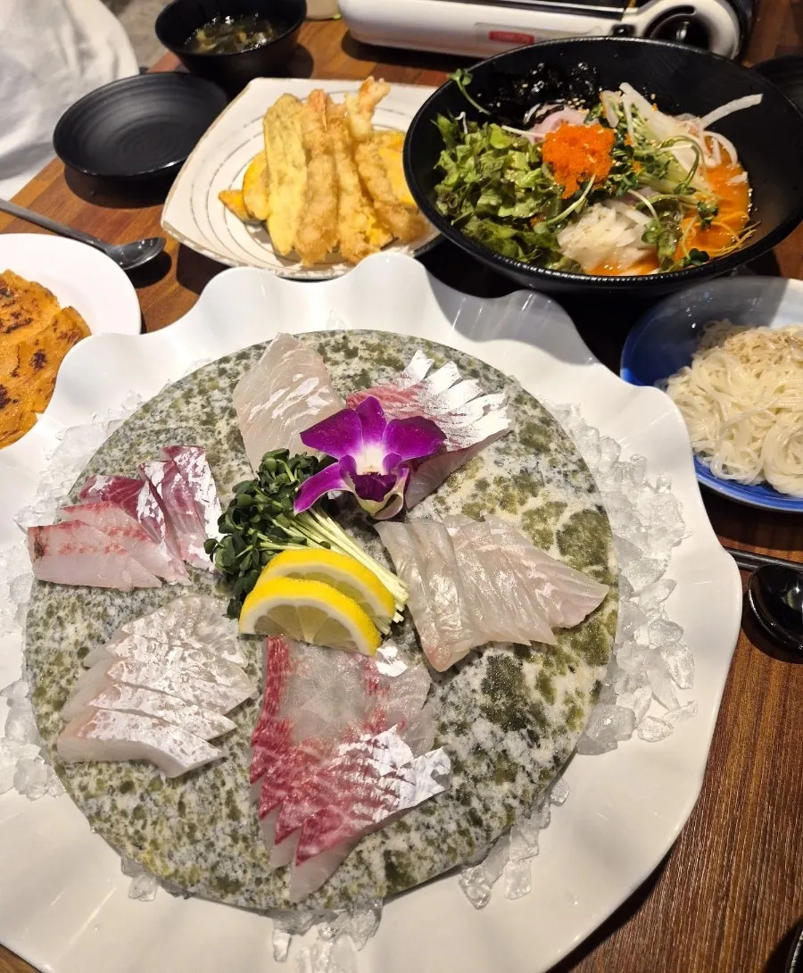 Flounder and rockfish sashimi sliced to just the right thickness