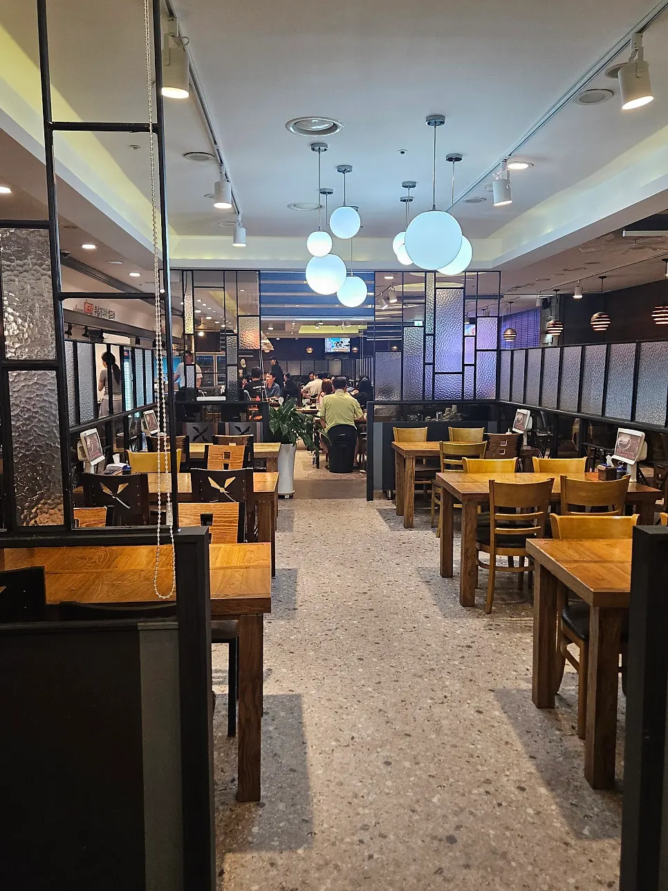 Dining hall with customers on an early weekend morning