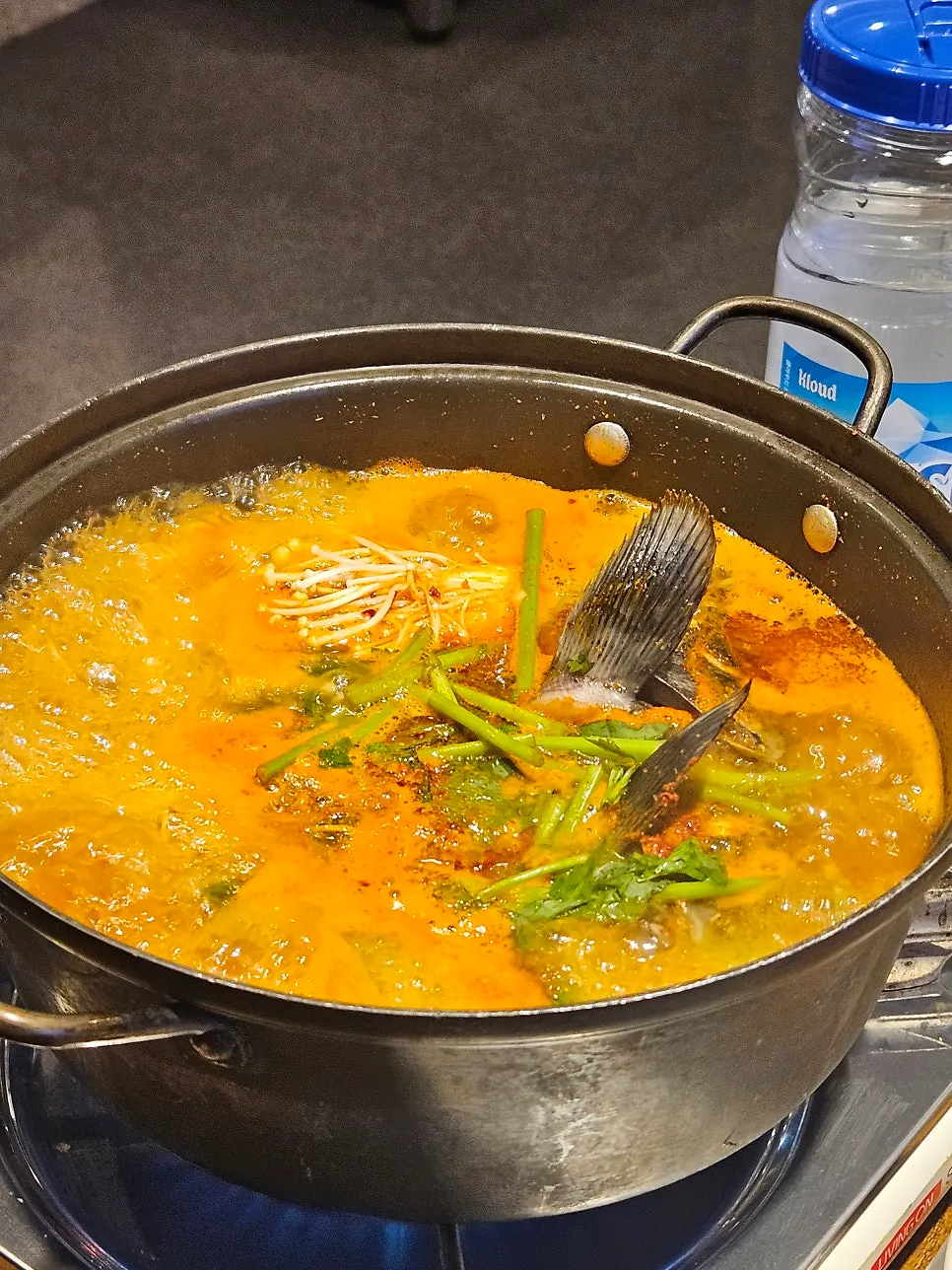 A bowl of spicy soup simmered to a rich finish