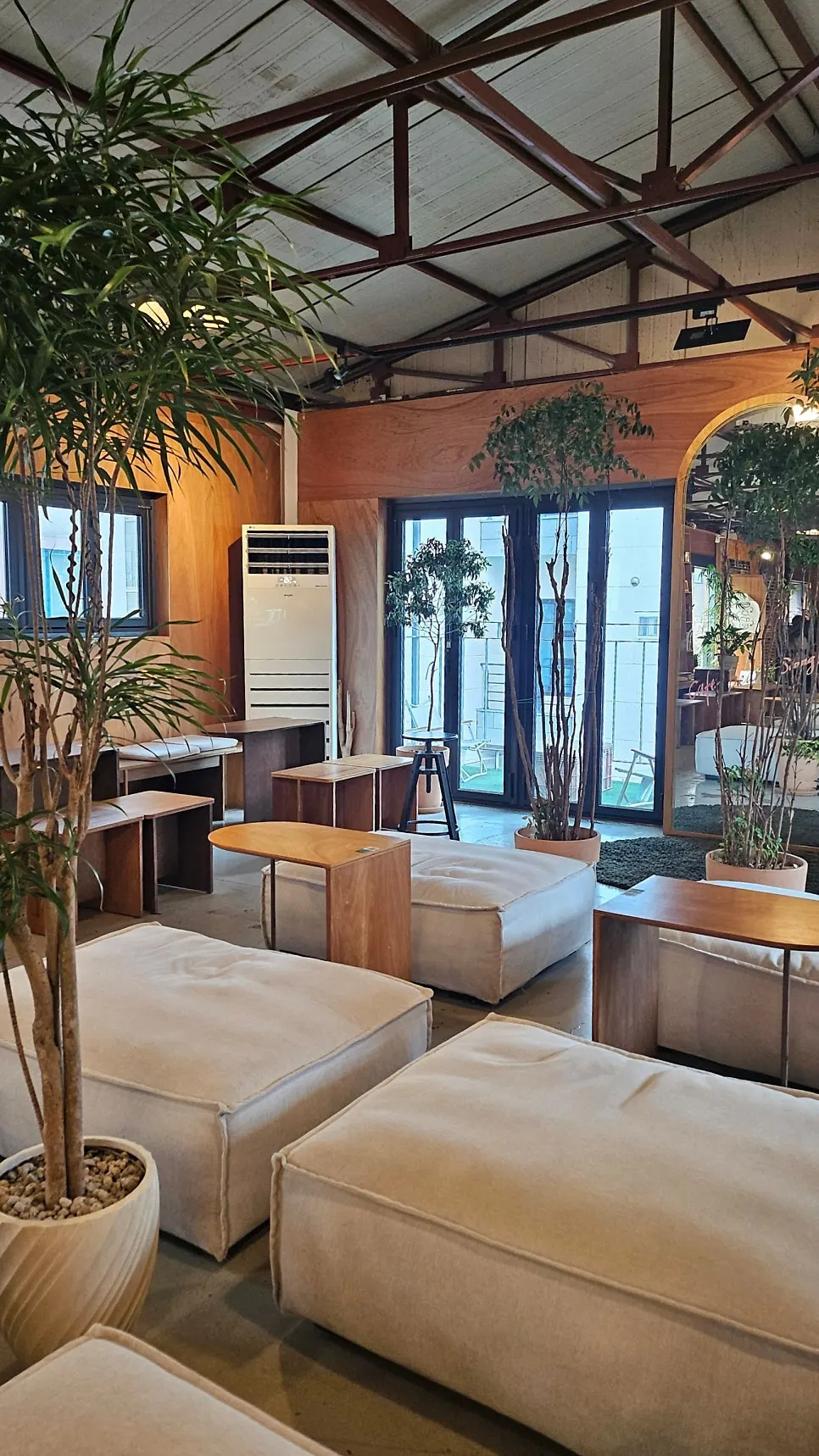 Café wall with frames made in the 1st-floor factory