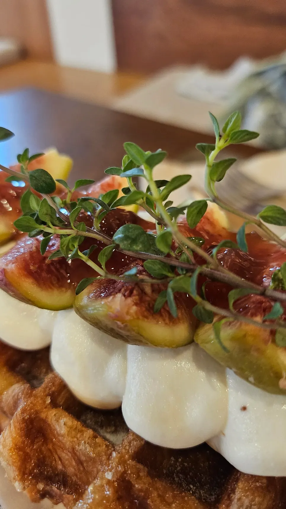 Close-up of the cream-sandwiched fig Greek croffle