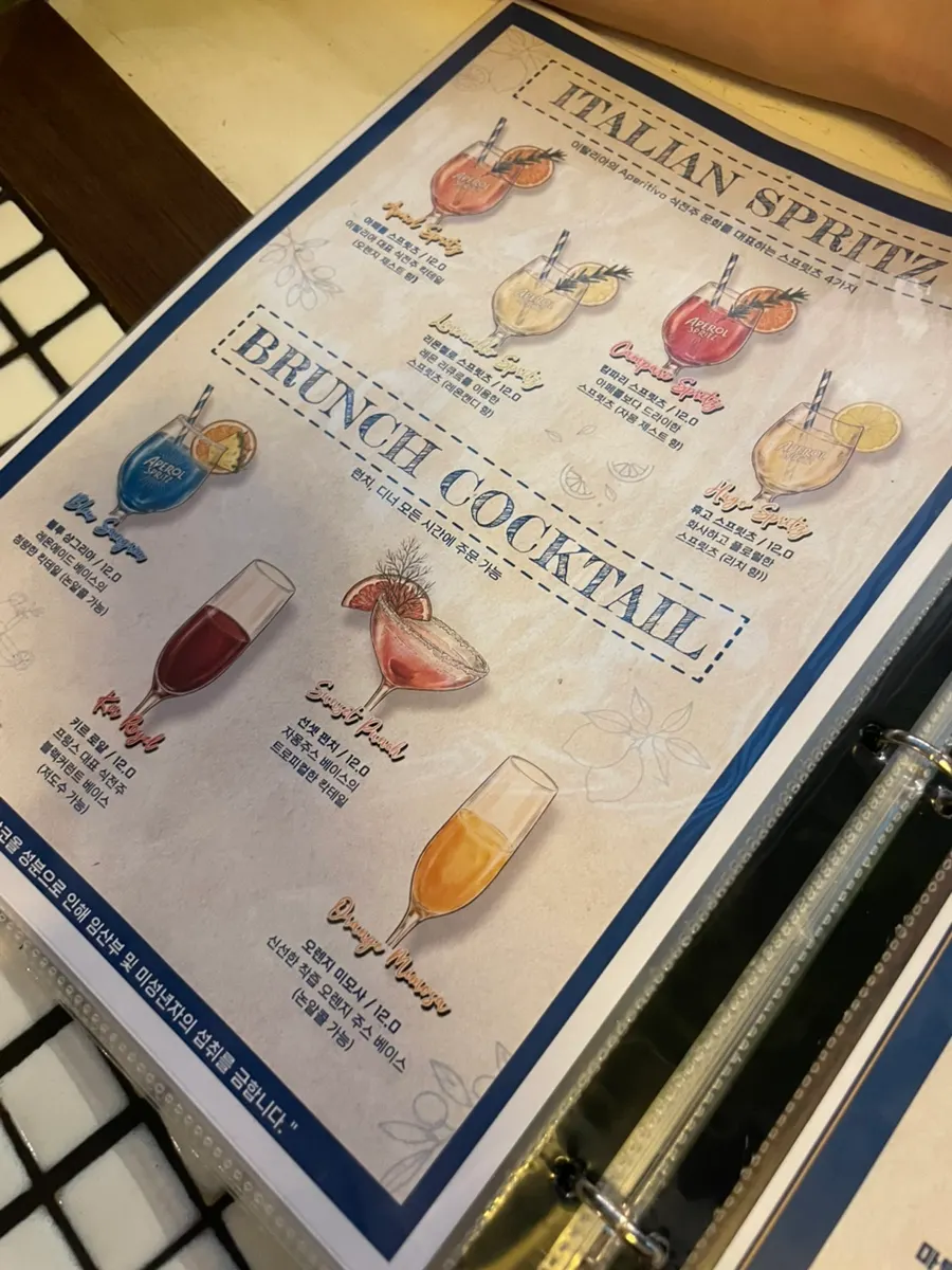 Browsing the menu while deciding what to order
