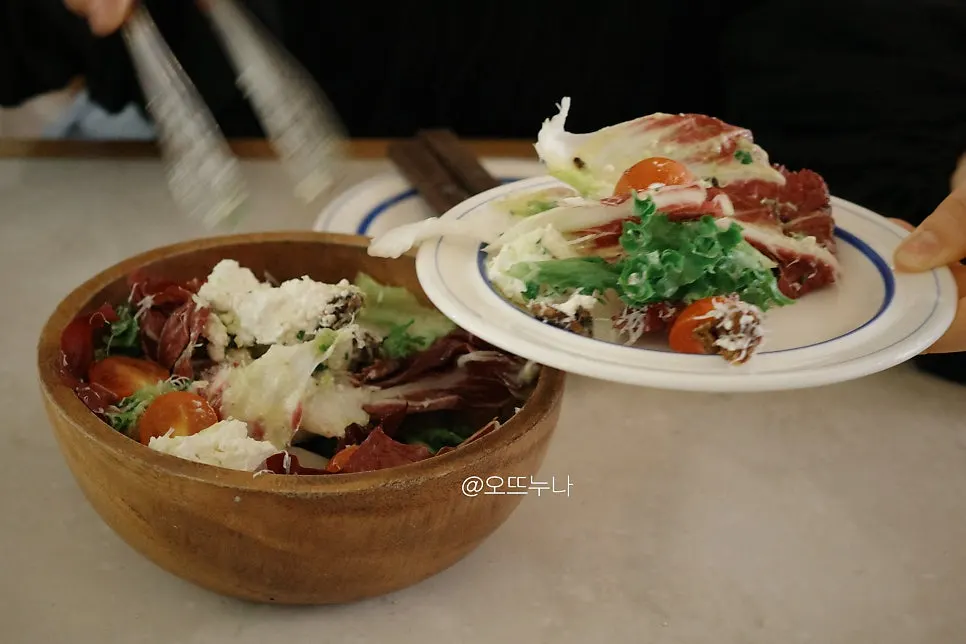 Close-up of the ricotta salad with cherry tomatoes and nuts