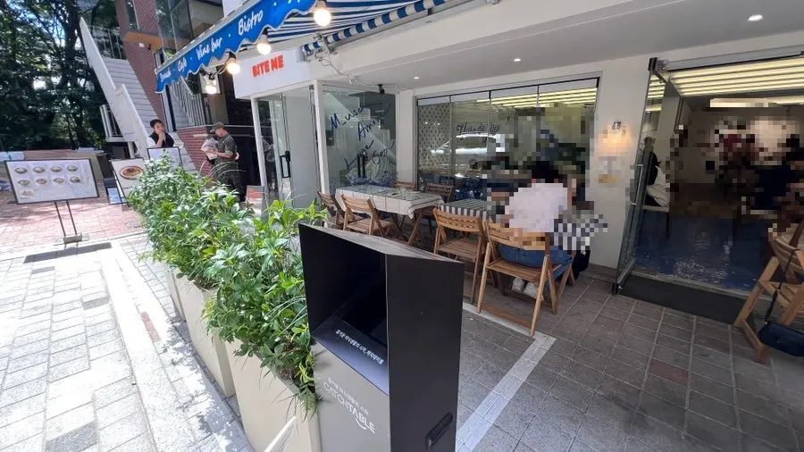 Side street in front of Billadeubeulleu Seongsu with terrace tables