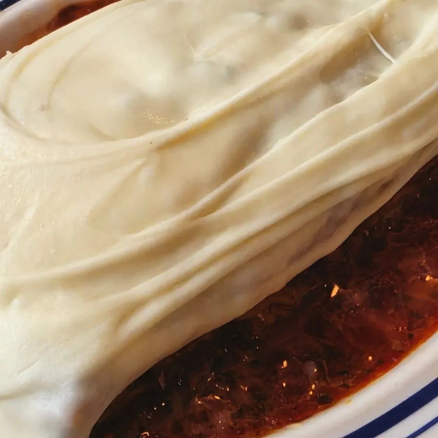 Lasagna cut into bite-sized pieces