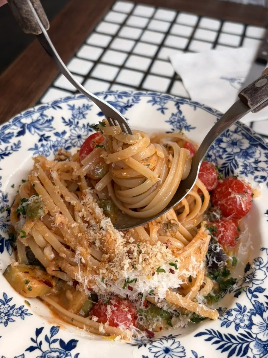 Forkful of puttanesca pasta