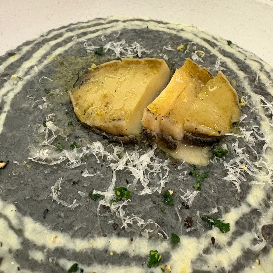 Close-up of the abalone squid-ink risotto
