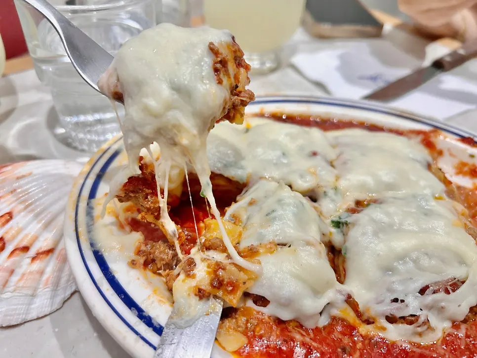 Stretchy cheese pull from the lasagna