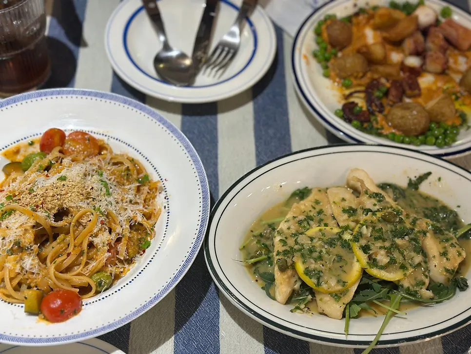Three dishes set out on the terrace table