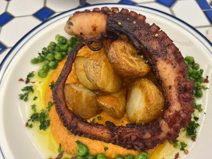Pollo mambo served with romesco sauce and potatoes