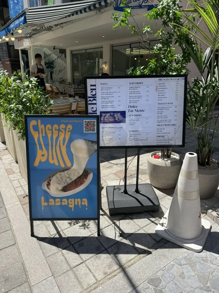Menu board set up outside the restaurant