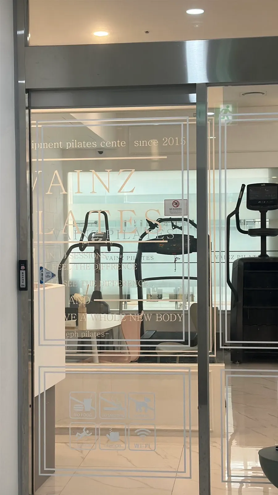 Equipment and class scene inside the Vines Pilates group lesson room