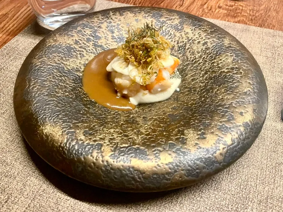 Plate of shrimp, celeriac, and brussels sprouts appetizer