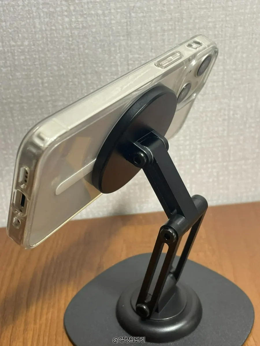 Stand with phone attachment and direction adjustment