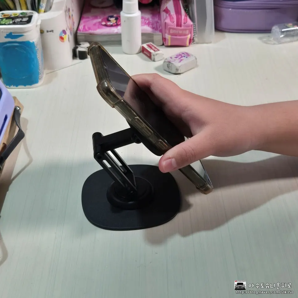 MagSafe phone stand used for watching smartphone videos