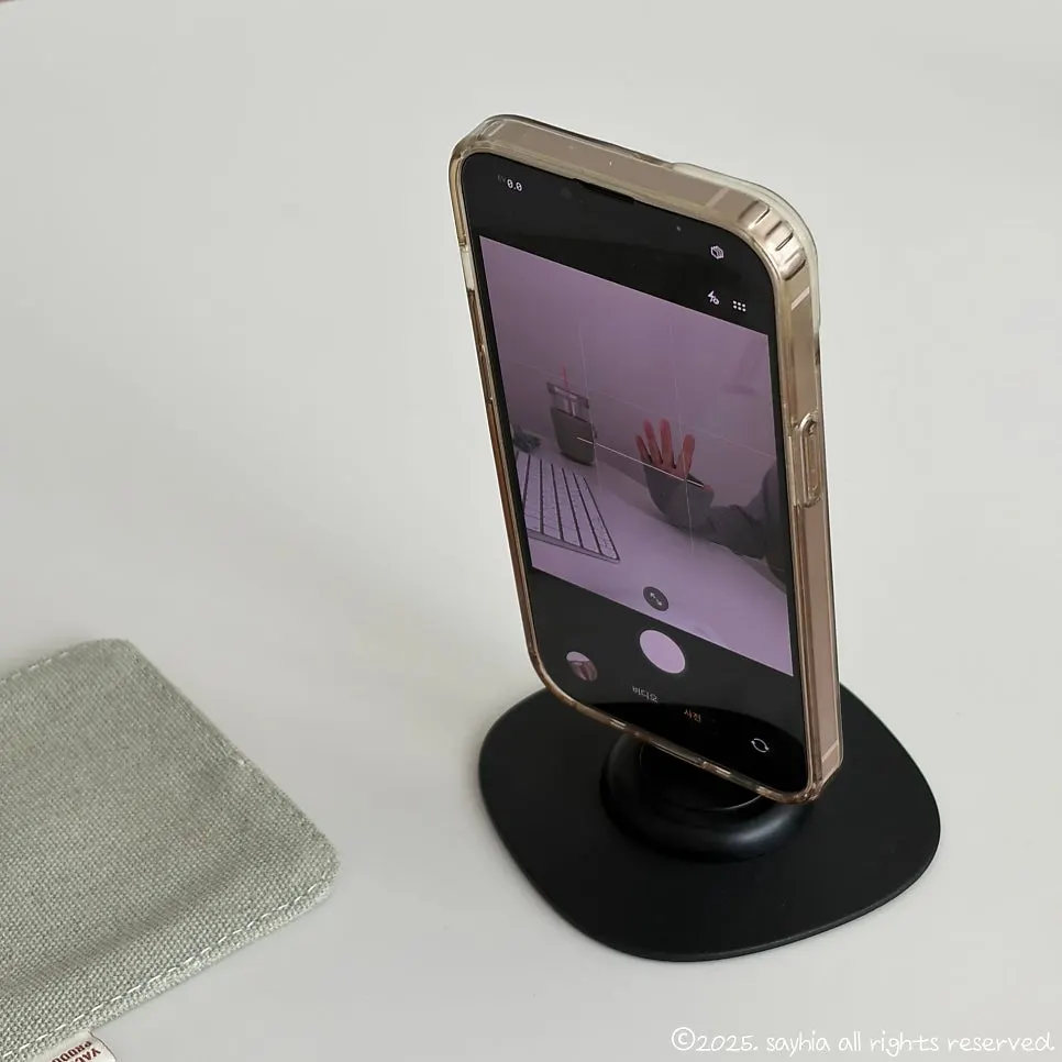 Filming setup with a smartphone attached to the MagSafe stand